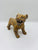 Jaguar Zapoteca parado amarillo viendo lado derecho