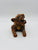 Jaguar echado naranja con collar chico