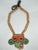 Collar Teotihuacano rojo con nariguera verde y tubos