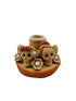Porta vela con calaveras y flores