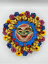 Sol con aves y flores