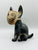 Xolo mediano negro con mascara viendo lado izquierdo